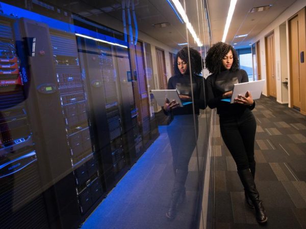 woman-engineer-with-laptop-in-data-center